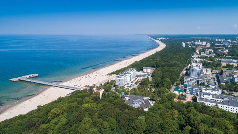 shutterstock_1497500897 Aerial view of Kolobrzeg - a beautiful city and spa on the Baltic Sea.jpg