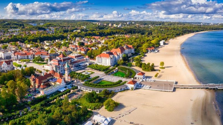 shutterstock_1833178075 The sunny scenery of Sopot city and Molo - pier on the Baltic Sea. Poland.jpg