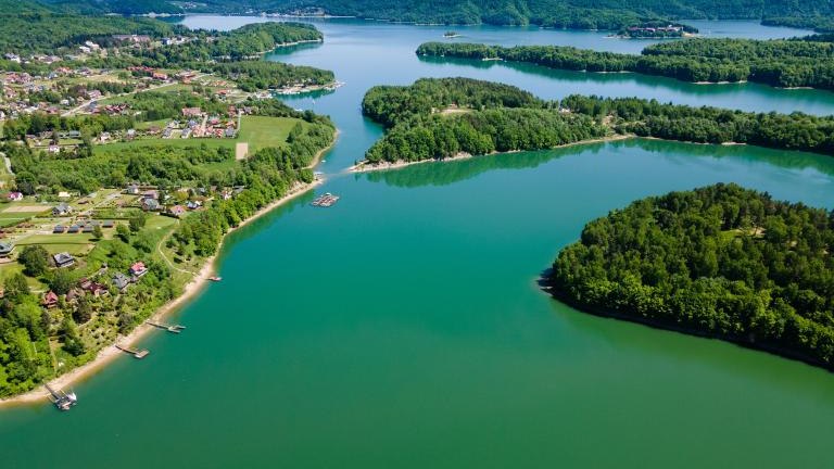 shutterstock_1983093434 Solina Lake and Polanczyk in Bieszczady Park, Poland at Summer Sunny Day. Drone View..jpg