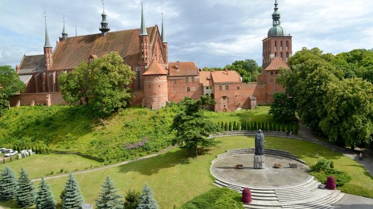 View of a cathedral complex and the area with a monument to Nicolaus Copernicus. Frombork, Poland shutterstock_691667473 (1).jpg